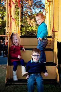 Ryan, Alexa and Jacob, young children.  They are at a playground.